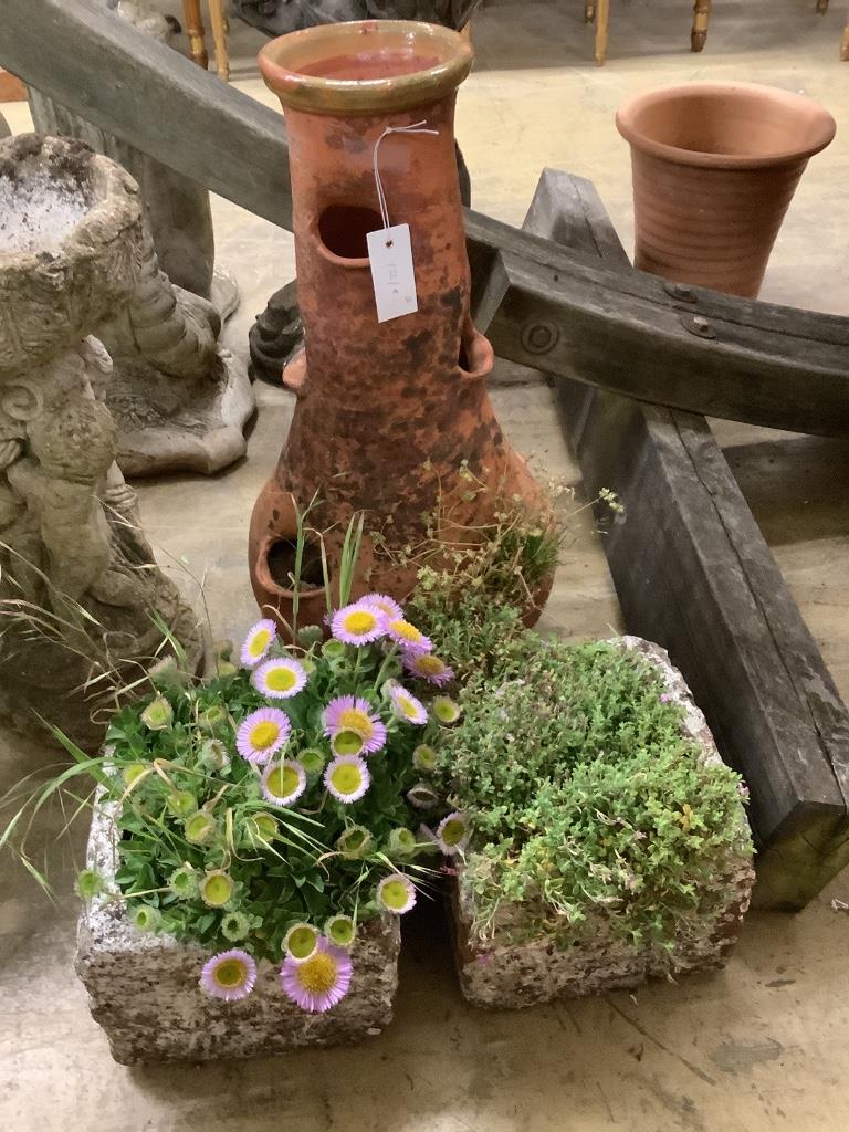 A terracotta strawberry pot, height 56cm together with a pair of stone square garden planters, width 22cm, height 19cm